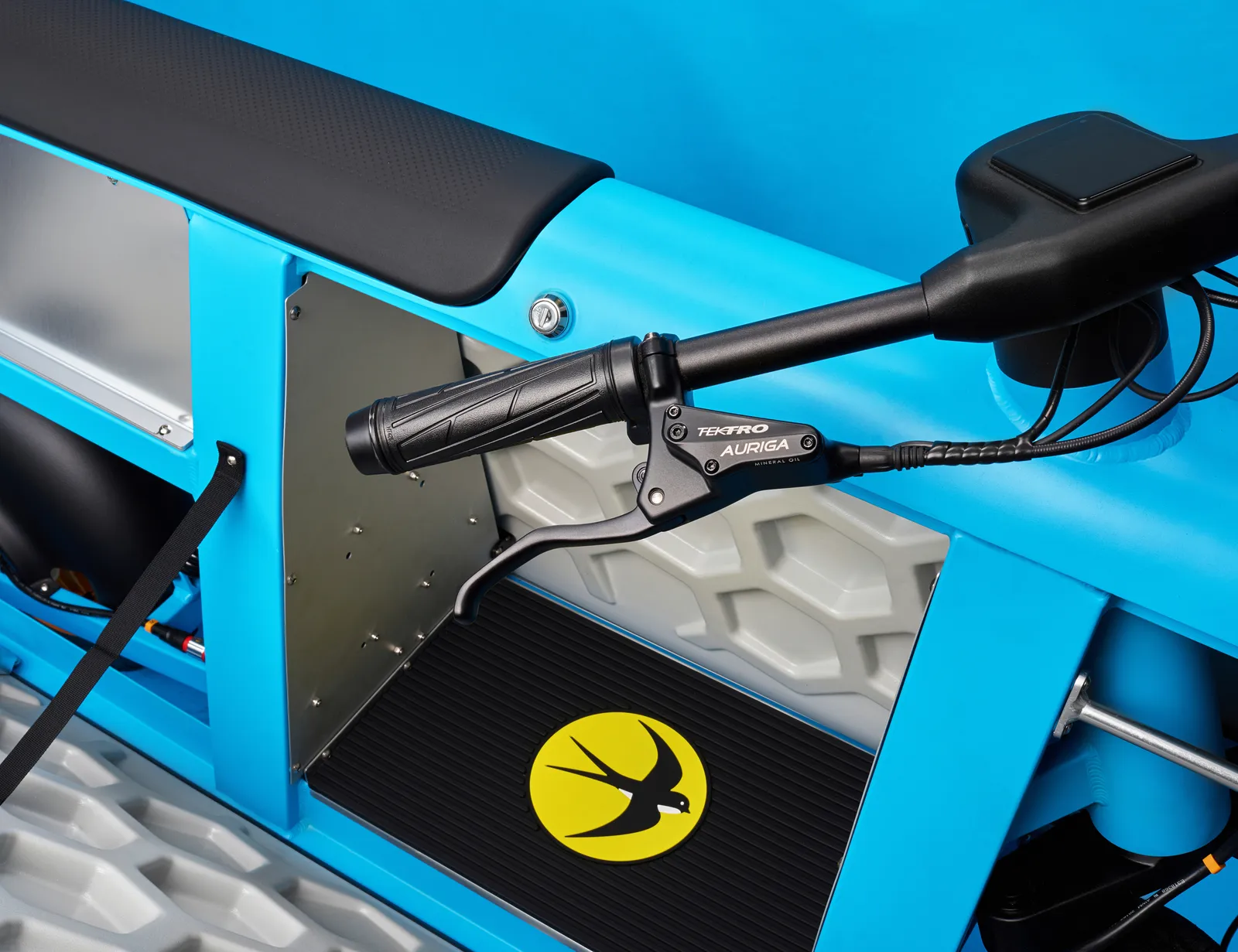 Sky blue Lightfoot with its side panel open to the cargo bay, swift badge and handlebar in view